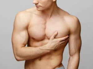 Patient after male breast reduction surgery