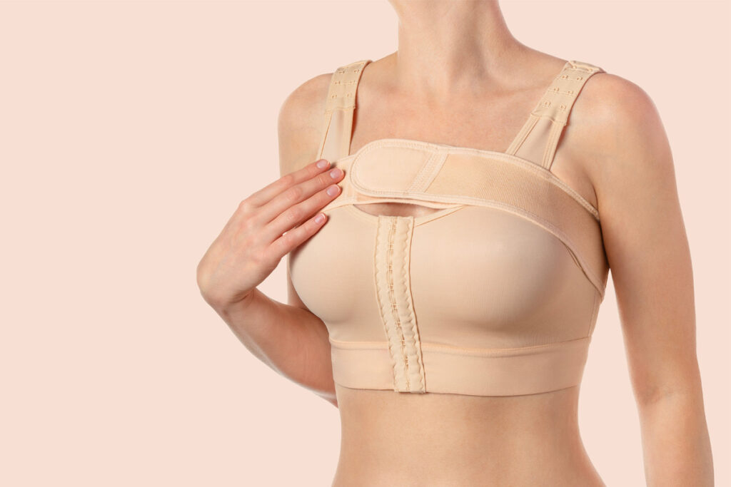  Close-up of a post-surgery bra for breast augmentation preparation.