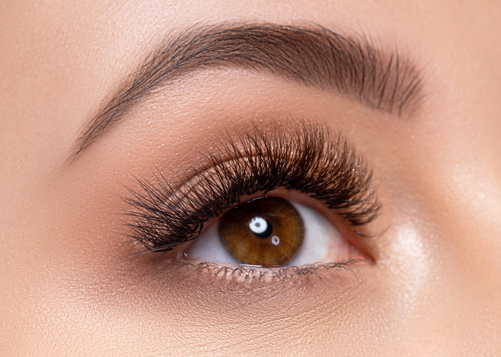 Close-up of an eye with a subtly lifted outer eyebrow post-lateral brow lift.