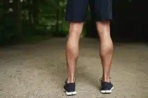 Calf implants create a more defined leg contour for men.