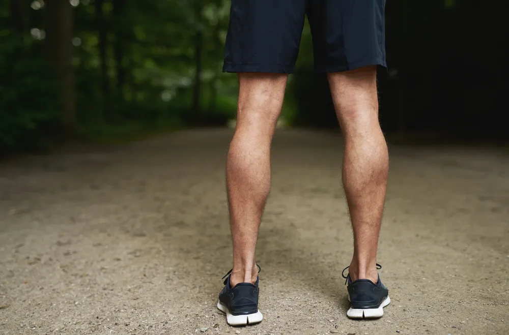 Calf implants create a more defined leg contour for men.