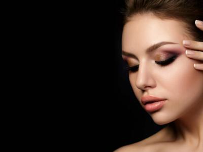 Close -up of a model with elevated eyebrows showcasing potential results of a direct brow lift.