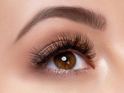 Close-up of an eye with a subtly lifted outer eyebrow post-lateral brow lift.