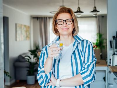 Middle-aged woman at the end of her weight loss journey enjoying her goal weight and only needing to recover from her full body lift procedure.